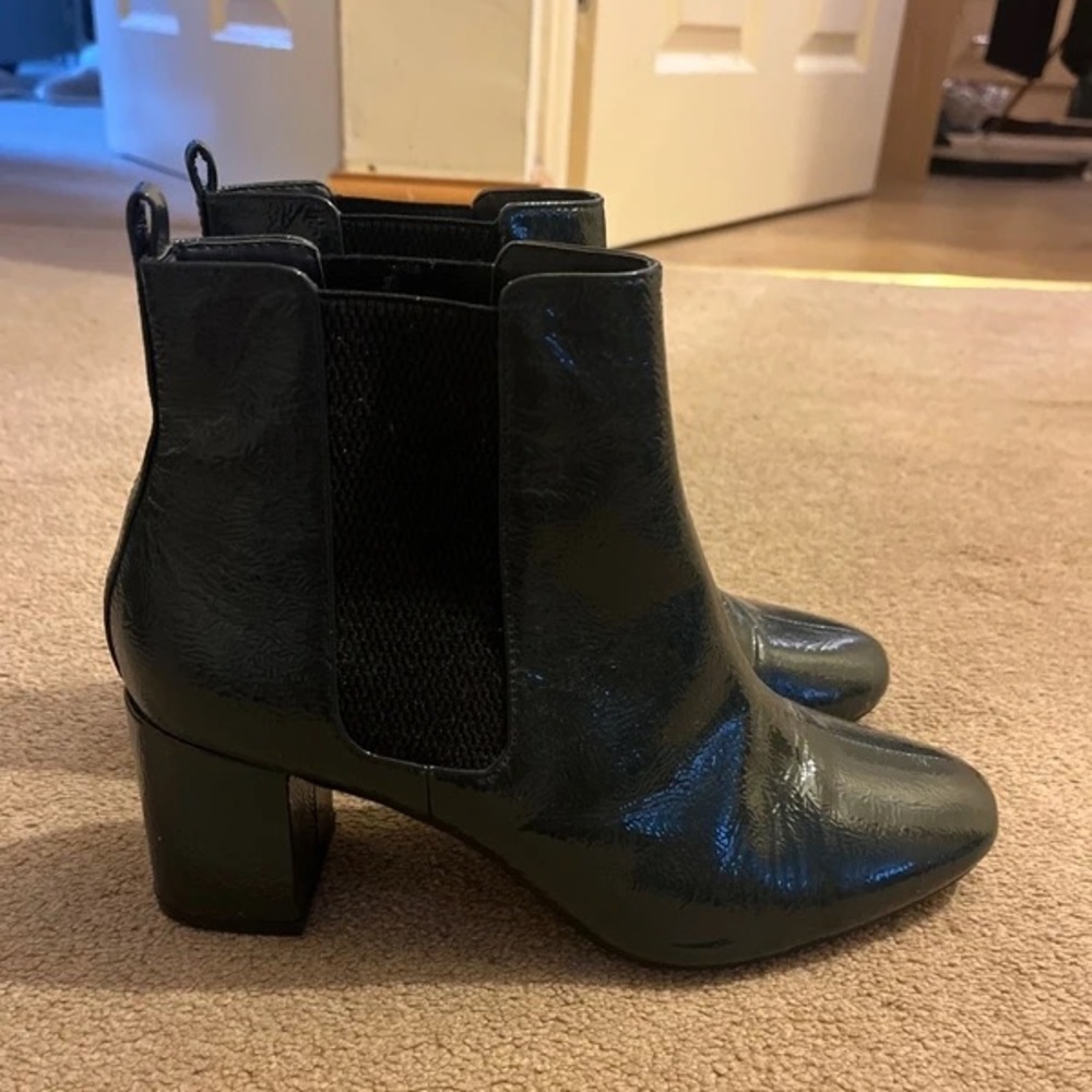 Sleek Black Leather Heeled Boots